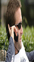 Man on cell phone image